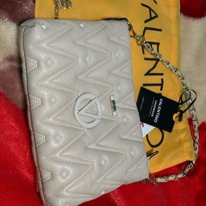 Beige Studded Valentino handbag.
